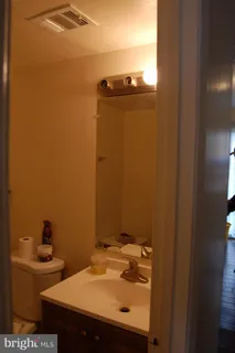 a bathroom with a sink and a toilet