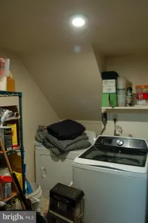 a kitchen with a stove and a microwave