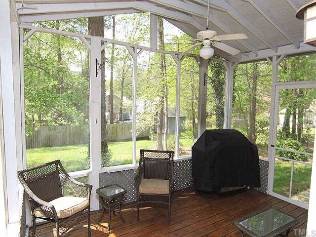 5312 McCormick Road Durham, NC 27713 - Photo 9 of 12 Time to relax on your new Screen Porch over looking flat wooded back yard Screened Porch