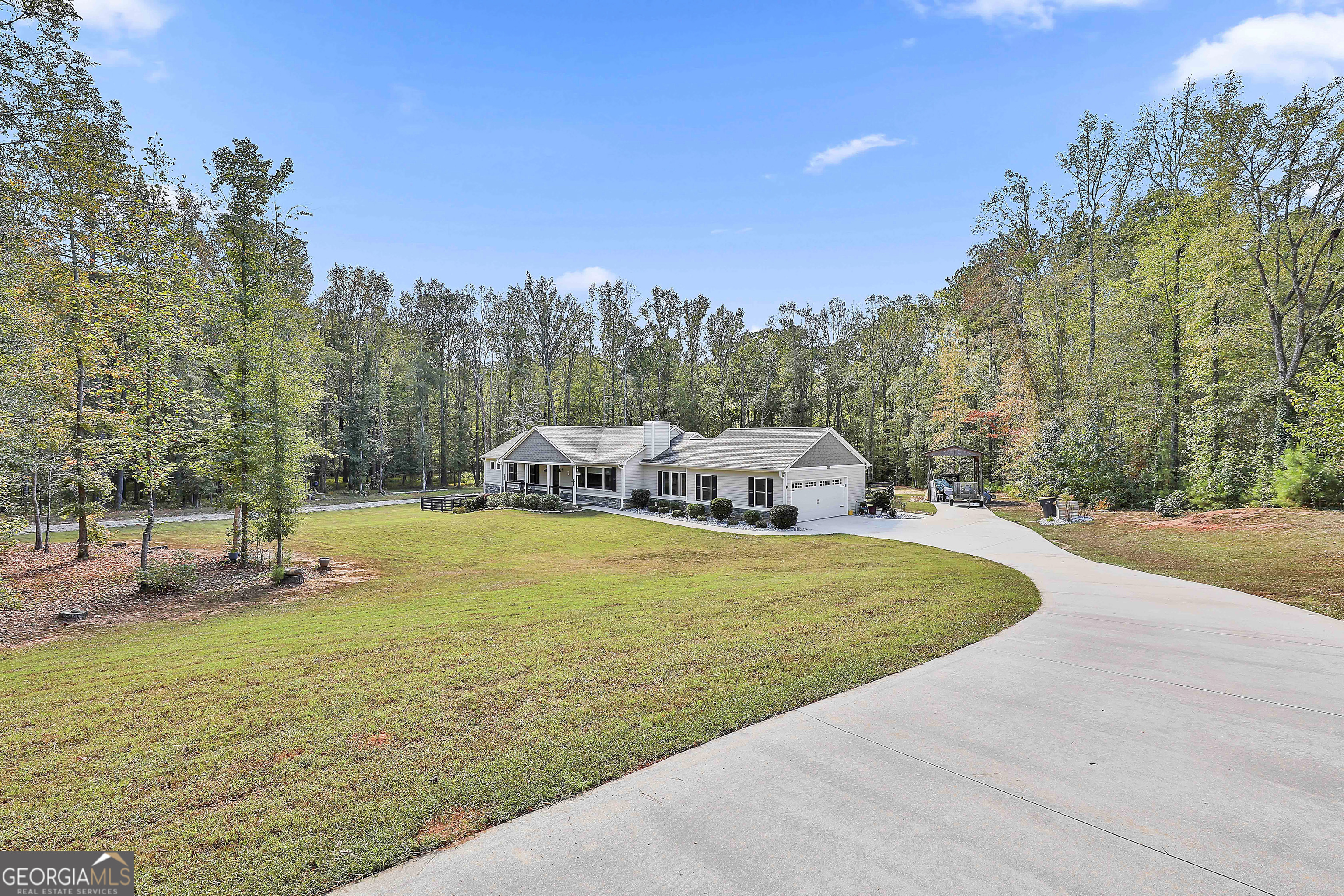 a view of a swimming pool with an outdoor space and seating area