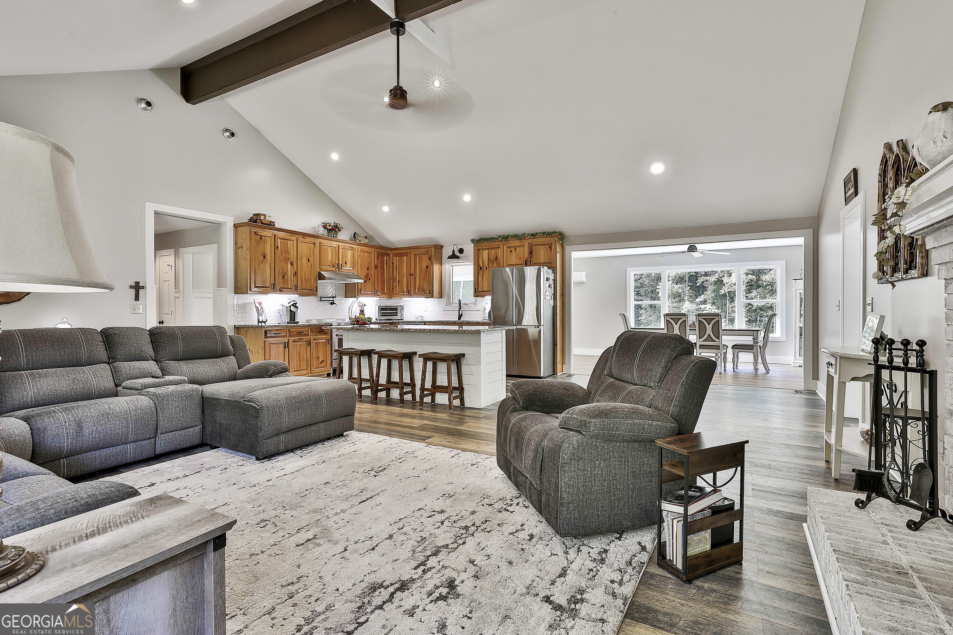 465 Little Road Sharpsburg, GA 30277 - Photo 11 of 67 a living room with furniture and a flat screen tv