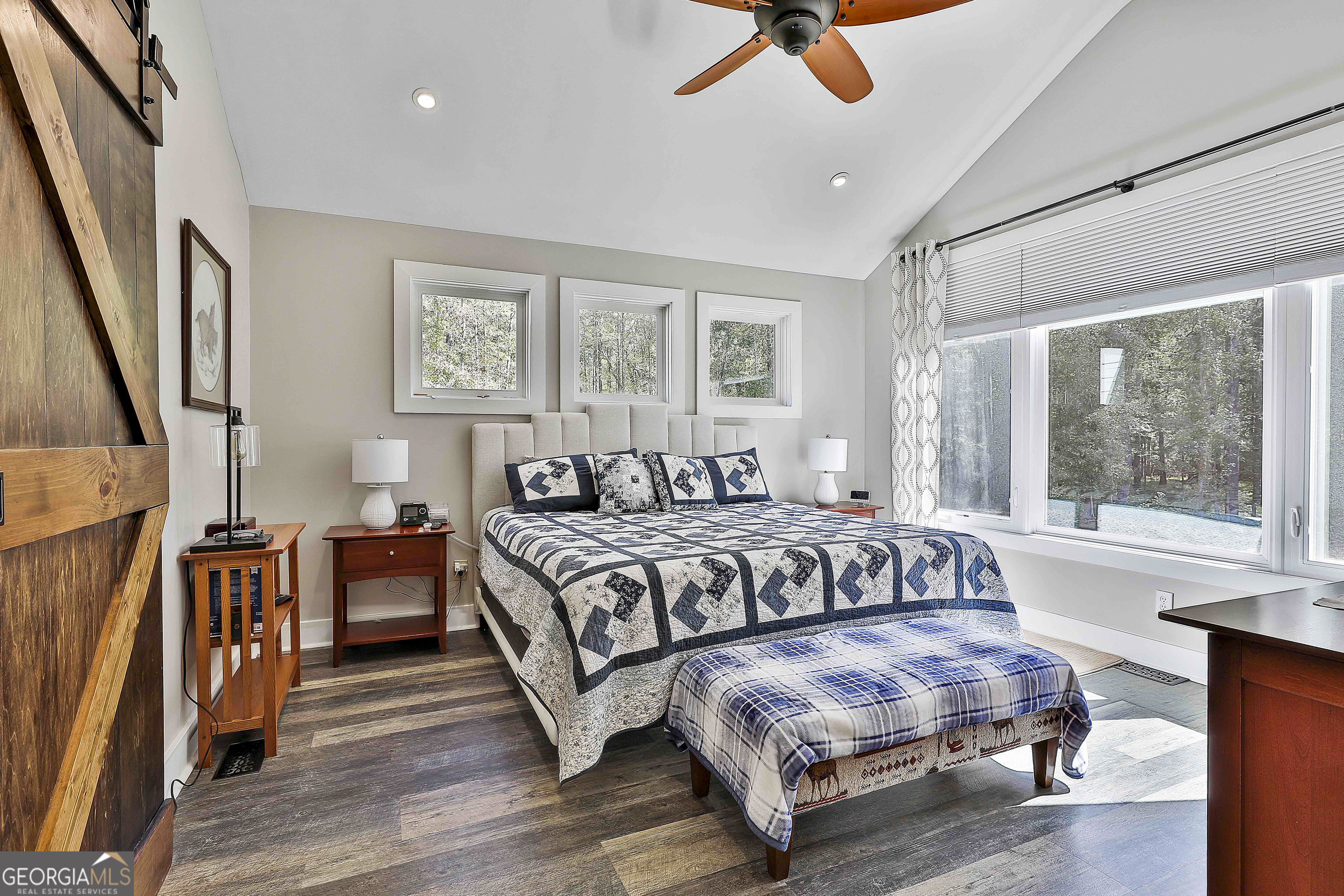 465 Little Road Sharpsburg, GA 30277 - Photo 27 of 67 a bedroom with furniture and wooden floor