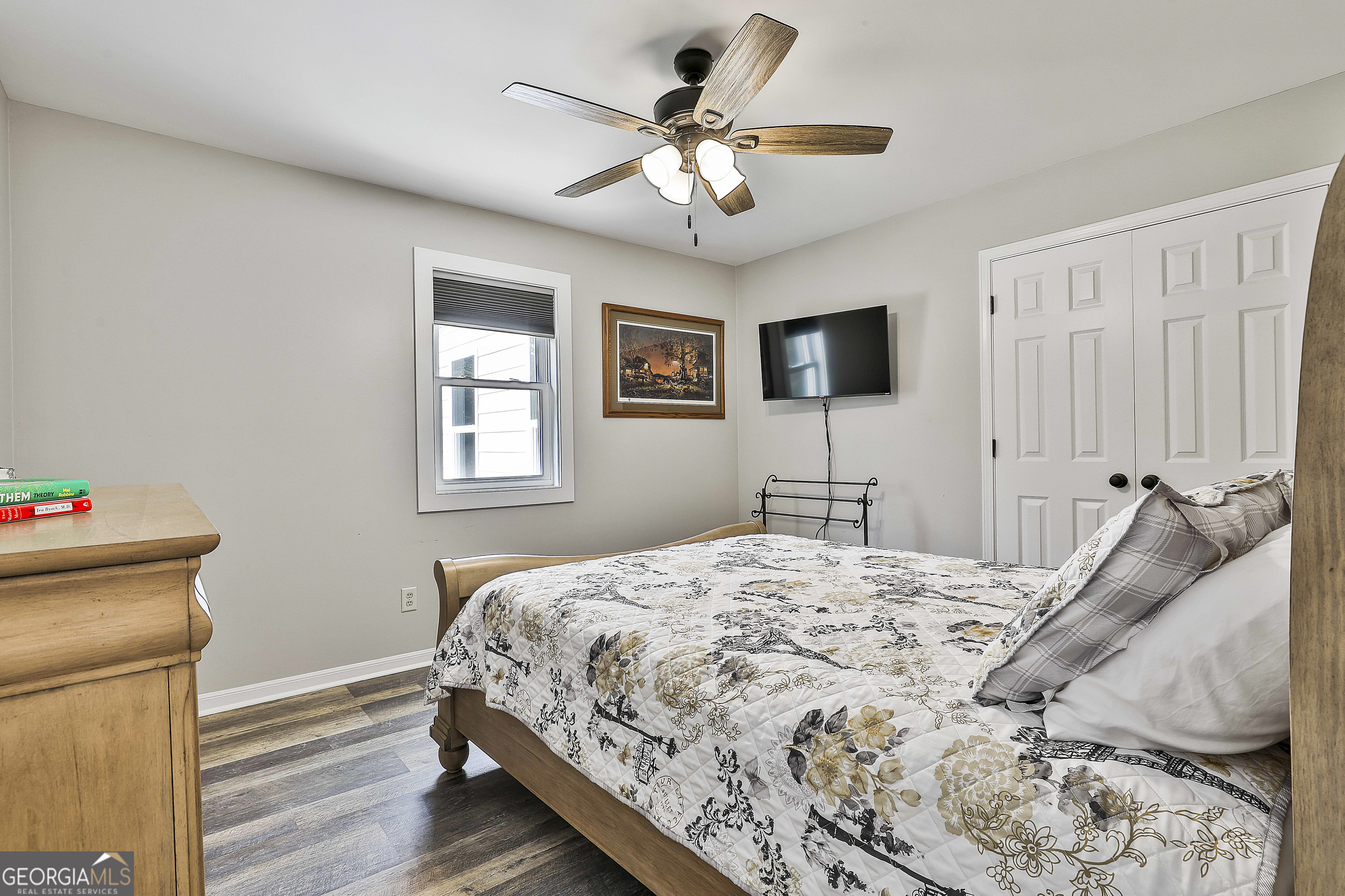 465 Little Road Sharpsburg, GA 30277 - Photo 34 of 67 a bedroom with a bed and a flat screen tv