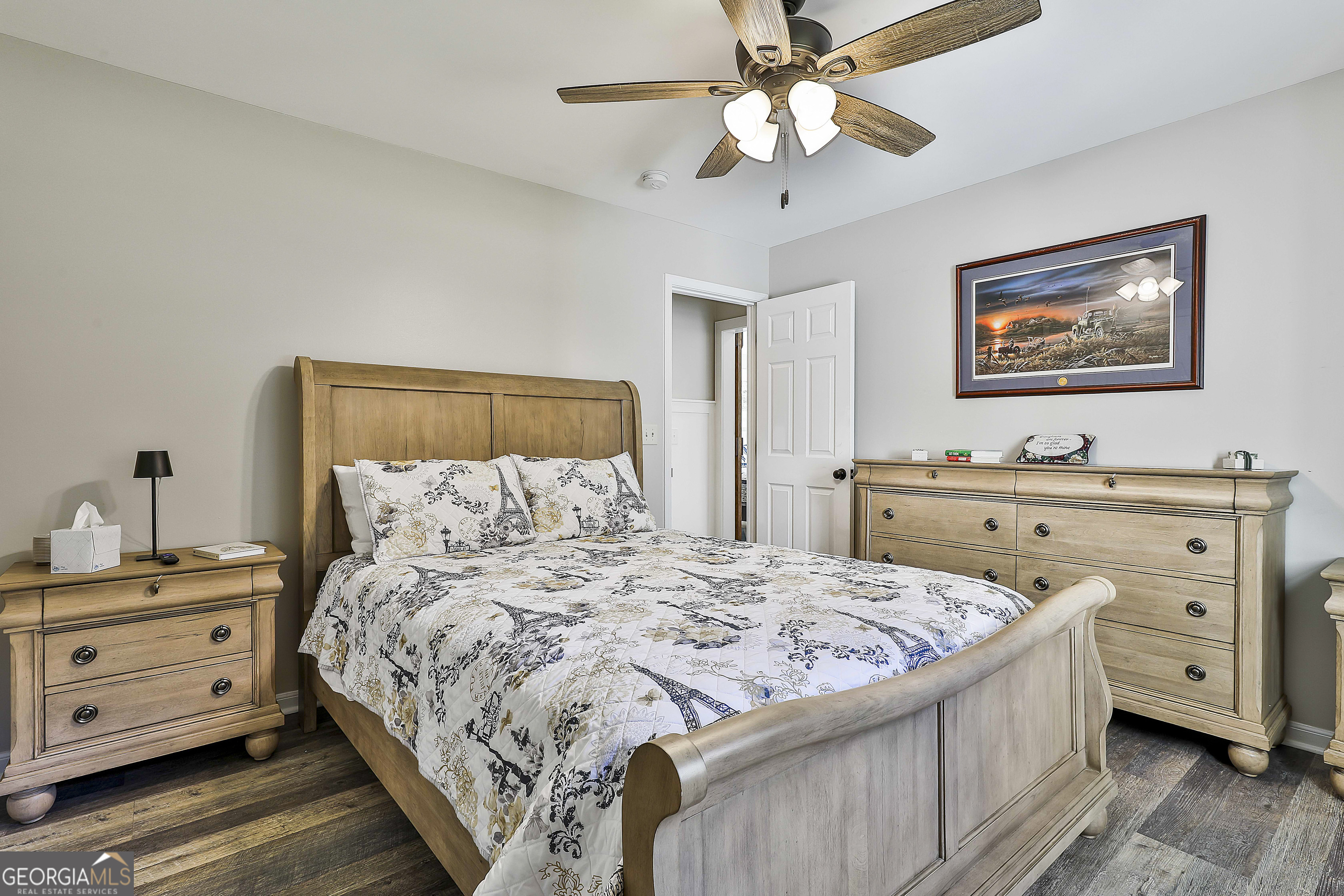 465 Little Road Sharpsburg, GA 30277 - Photo 35 of 67 a bedroom with a bed and a dresser