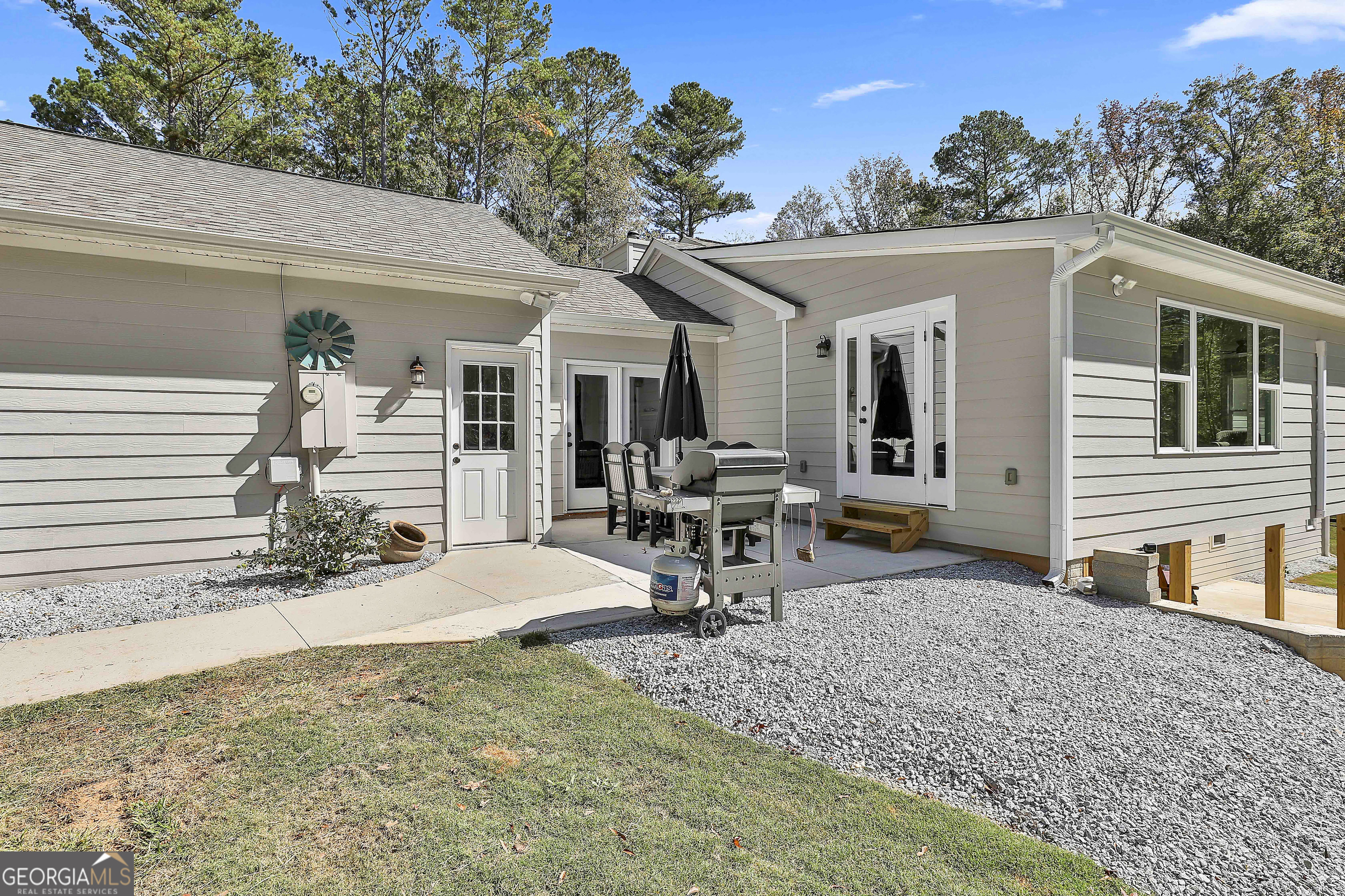 465 Little Road Sharpsburg, GA 30277 - Photo 55 of 67 a view of a house with backyard porch and sitting area