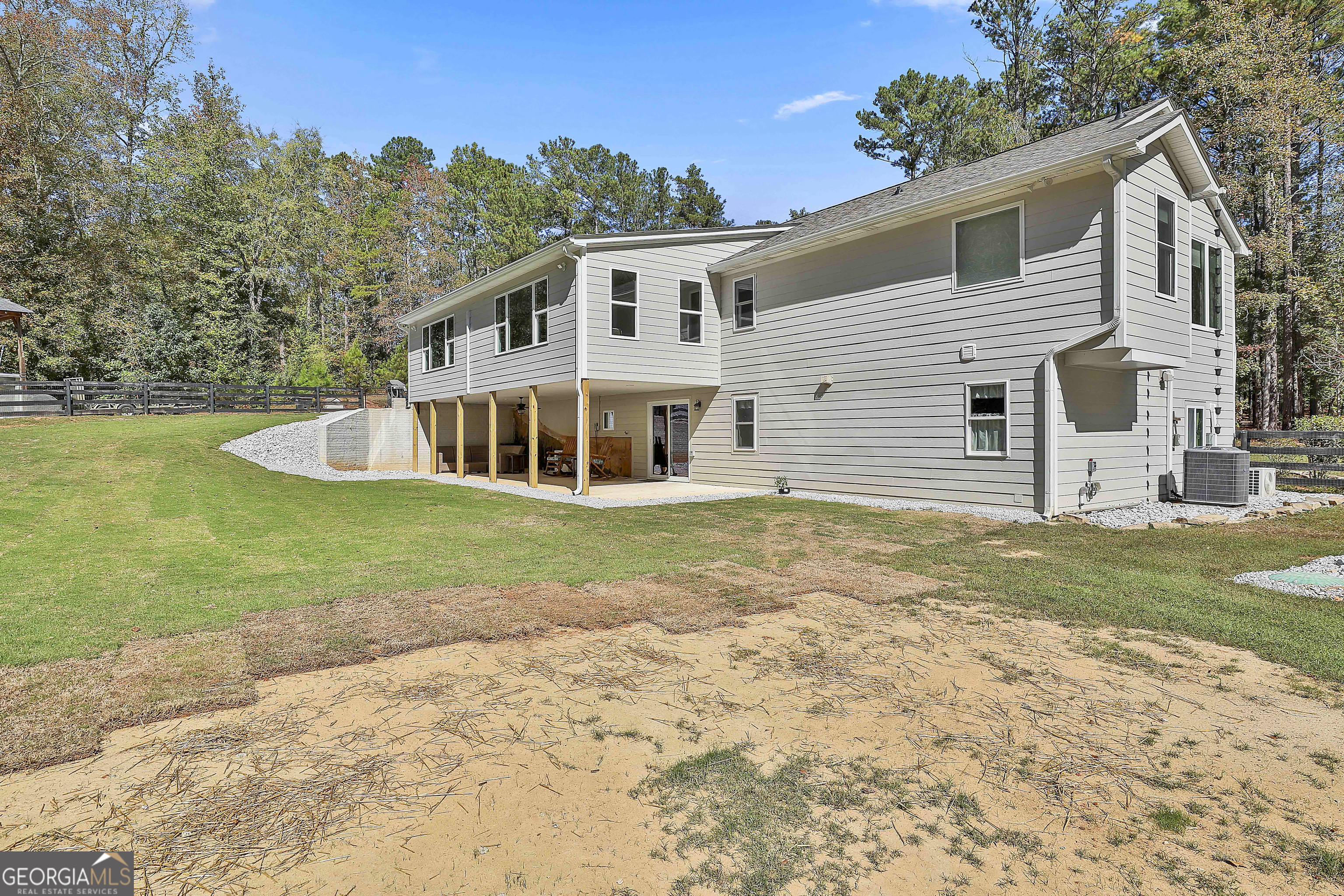 465 Little Road Sharpsburg, GA 30277 - Photo 60 of 67 a front view of a house with garden