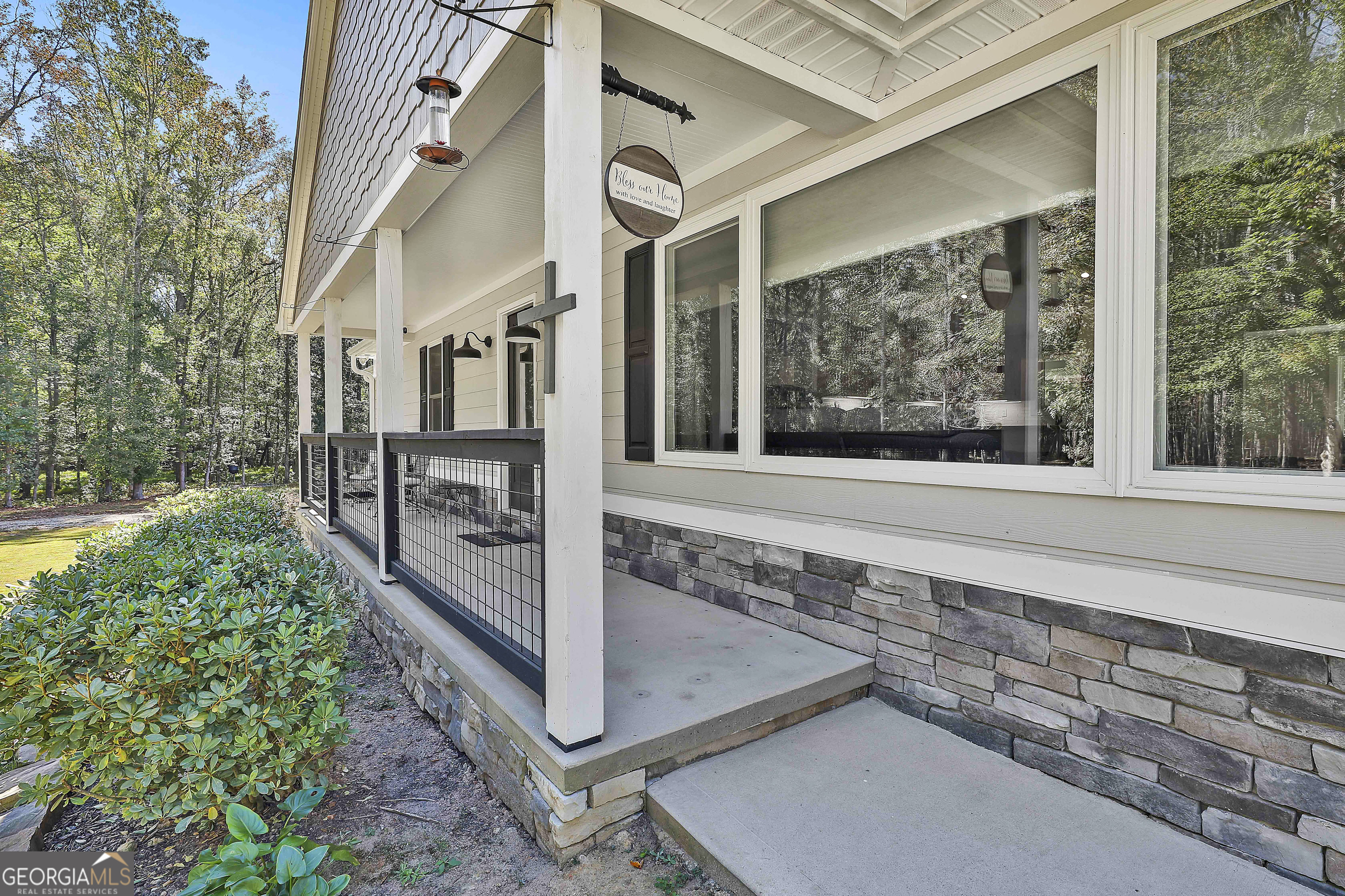 465 Little Road Sharpsburg, GA 30277 - Photo 7 of 67 a view of a house with a street
