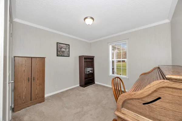 a view of a livingroom with furniture