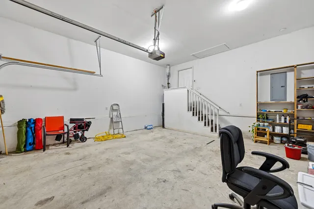 a view of a workspace with furniture