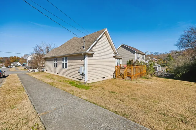 a very nice looking house with a large window