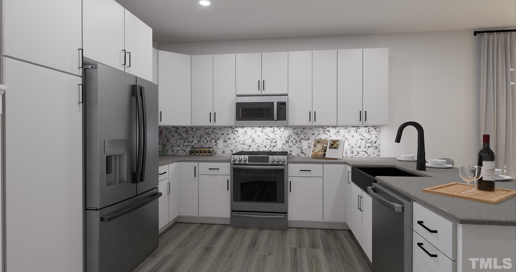 3814 Milltown Ridge Run Raleigh, NC 27612 - Photo 7 of 16 a kitchen with granite countertop white cabinets and stainless steel appliances