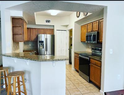 225 Murcia Drive, Unit 208 Jupiter, FL 33458 - Photo 13 of 32 a kitchen with stainless steel appliances granite countertop a sink and a stove