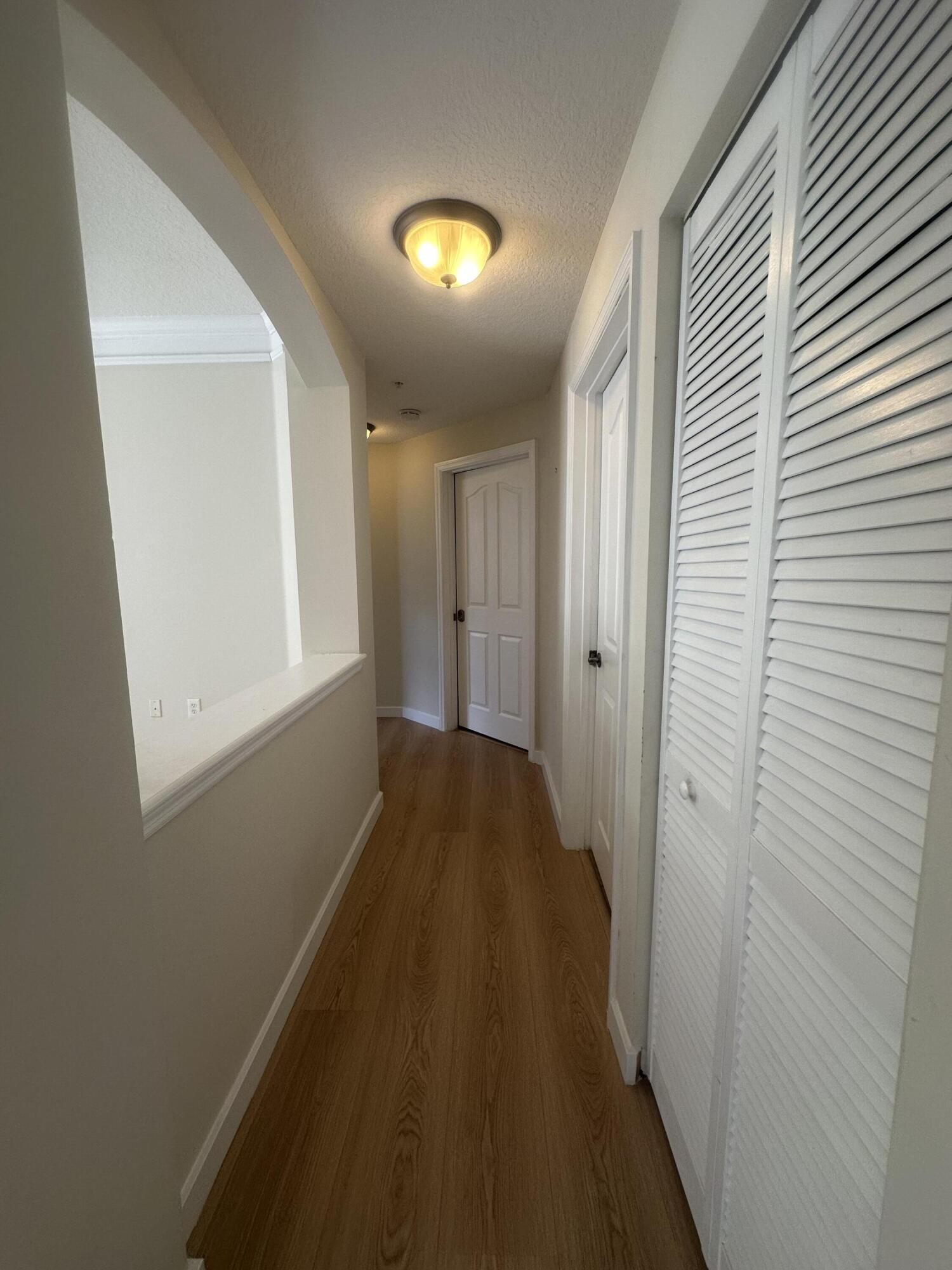 225 Murcia Drive, Unit 208 Jupiter, FL 33458 - Photo 15 of 32 a view of a hallway
