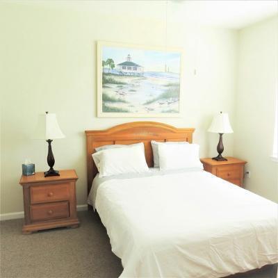 225 Murcia Drive, Unit 208 Jupiter, FL 33458 - Photo 22 of 32 a bedroom with bed and window