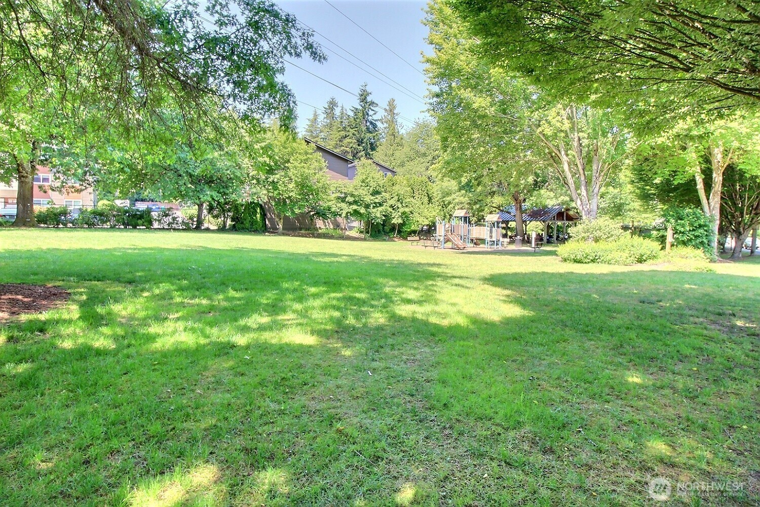 220 Southwest Clark Street, Unit B303 Issaquah, WA 98027 - Photo 16 of 19 a view of field with trees in the background