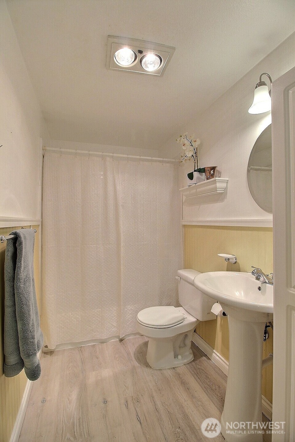 220 Southwest Clark Street, Unit B303 Issaquah, WA 98027 - Photo 8 of 19 a bathroom with a sink toilet and shower