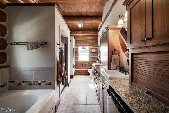 a bedroom with furniture and a gym equipment