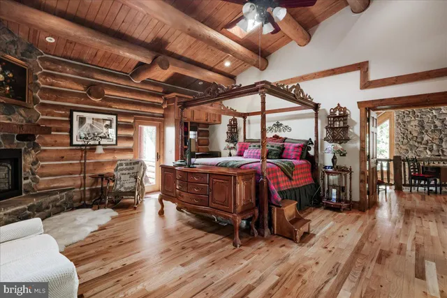 a view of a dining room with furniture wooden floor and chandelier