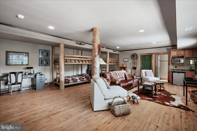 a view of balcony with deck and wooden floor