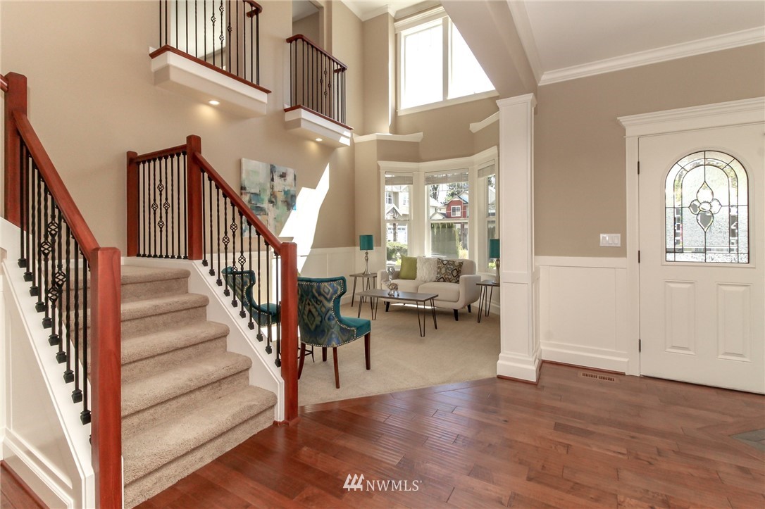 812 South 34th Place Renton, WA 98055 - Photo 14 of 31 a view of entryway and hall with wooden floor