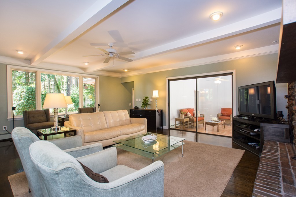 46 Algonquin Road Canton, MA 02021 - Photo 15 of 30 a living room with furniture and a flat screen tv