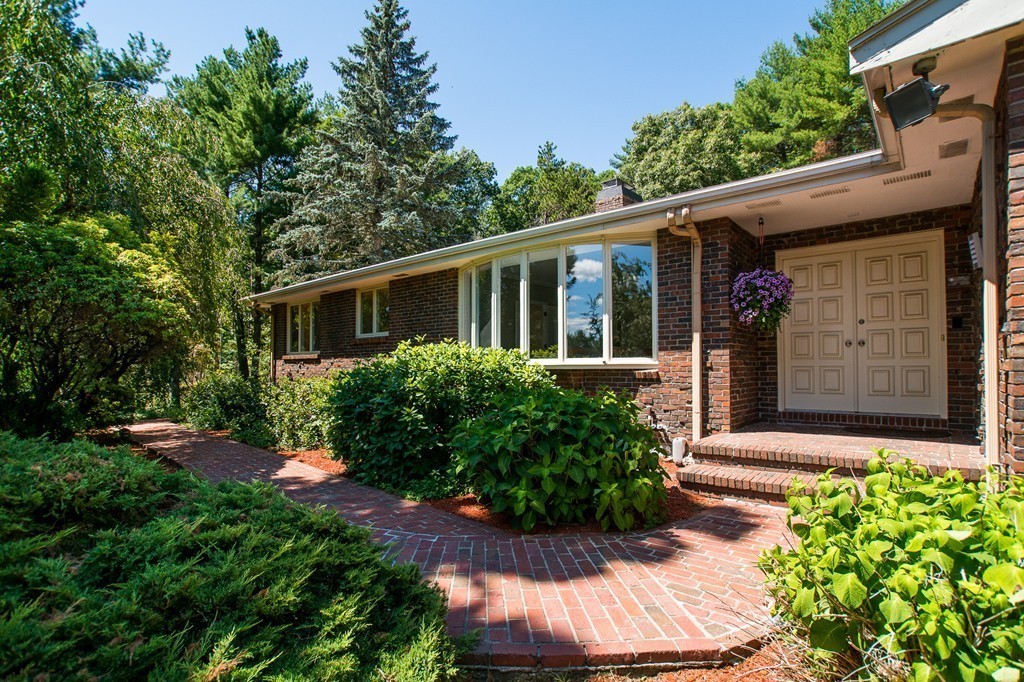 46 Algonquin Road Canton, MA 02021 - Photo 5 of 30 a front view of a house with garden