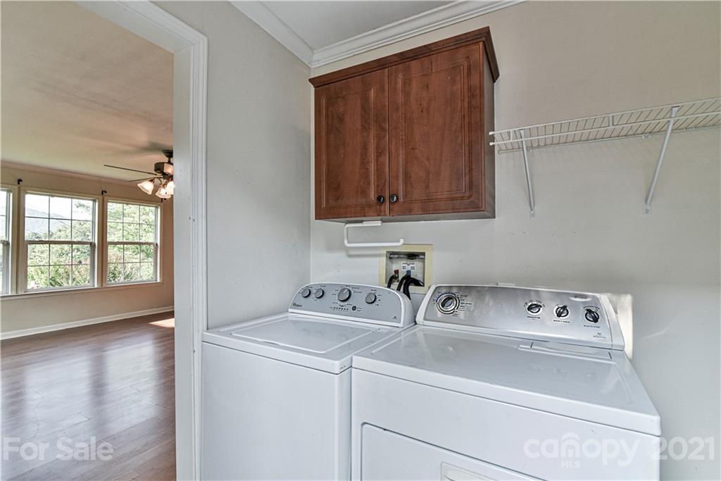 699 Pleasant Hill Road Clyde, NC 28721 - Photo 15 of 32 a utility room with dryer and washer