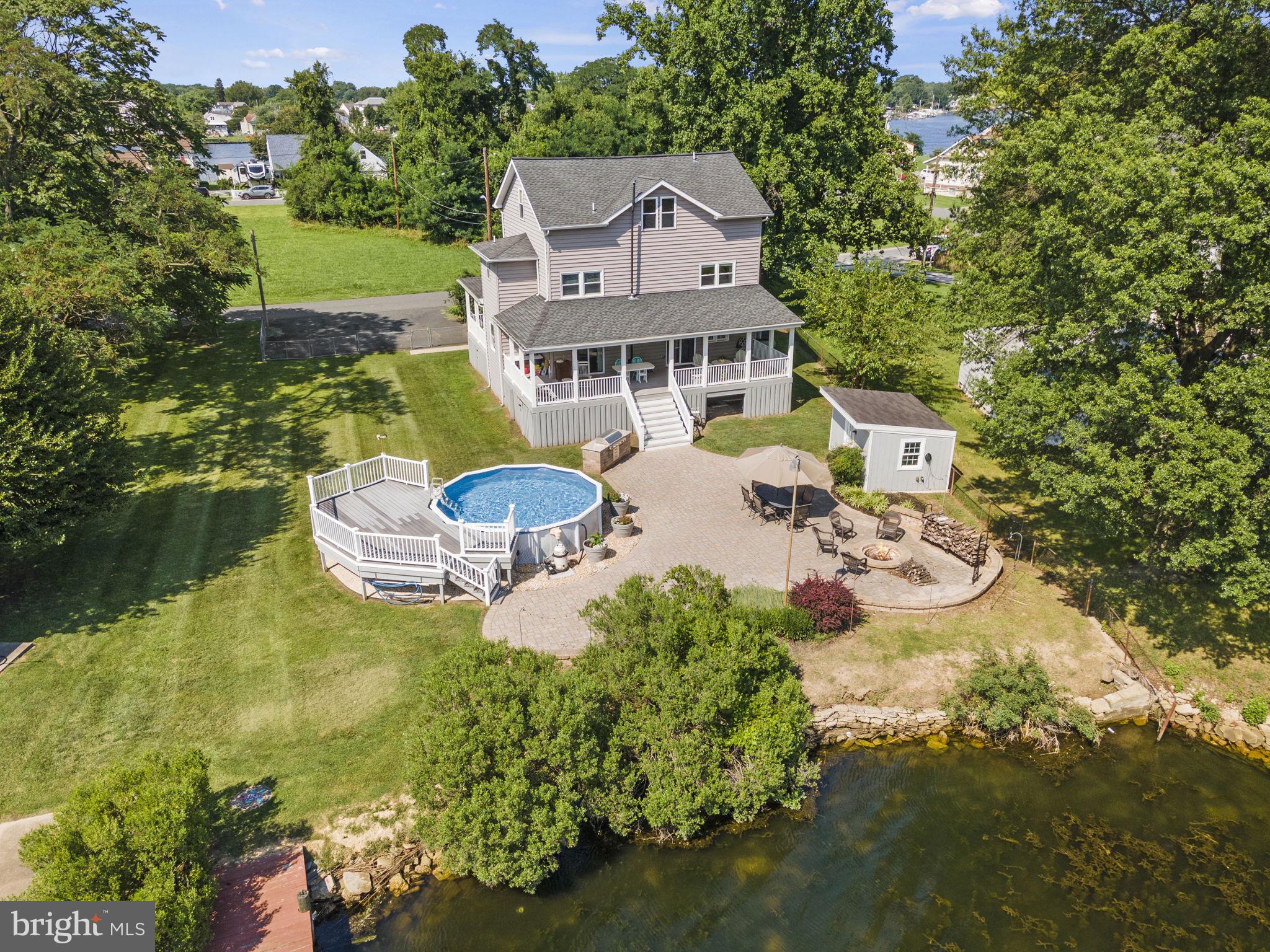 8646 Sandy Plains Road Dundalk, MD 21222 - Photo 1 of 38 an aerial view of a house with a ocean view