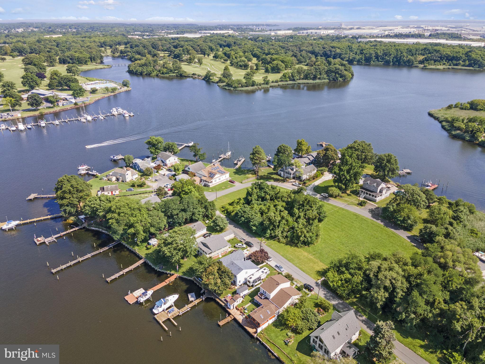 8646 Sandy Plains Road Dundalk, MD 21222 - Photo 33 of 38 an aerial view of a house with a lake view