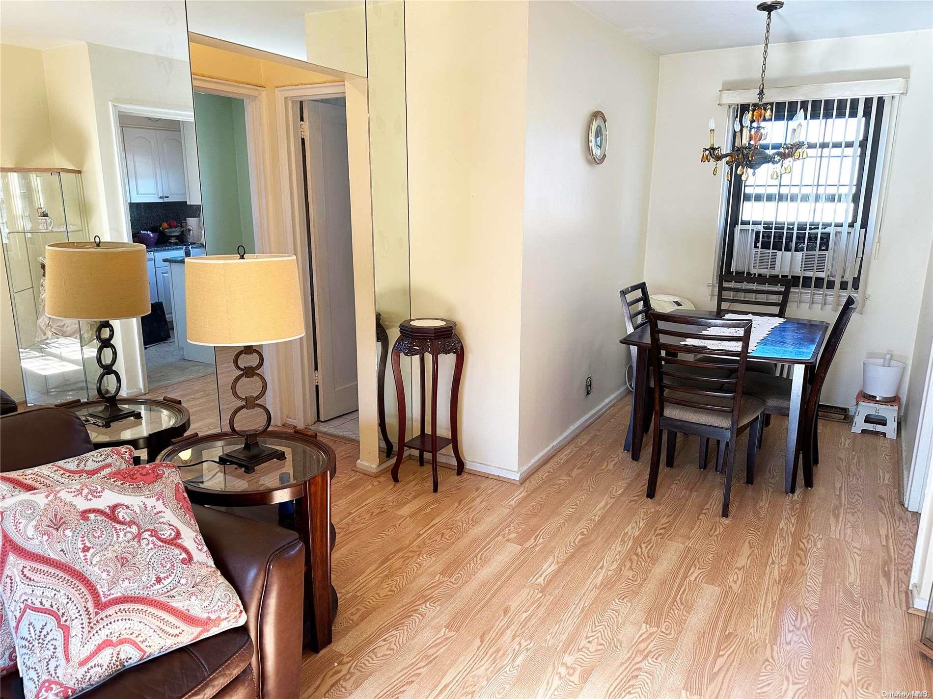 141-30 77th Road, Unit 3A Queens, NY 11367 - Photo 12 of 19 a view of a workspace with furniture and a window