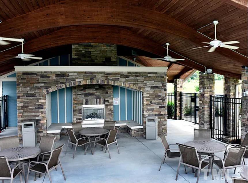5205 Windmere Chase Drive Raleigh, NC 27616 - Photo 38 of 39 a dining room with a table and chairs