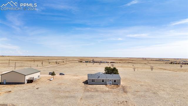 8160 Edison Road Yoder, CO 80864 - Photo 35 of 42 View of yard featuring a rural view