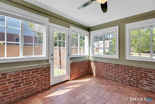 a view of empty room with windows