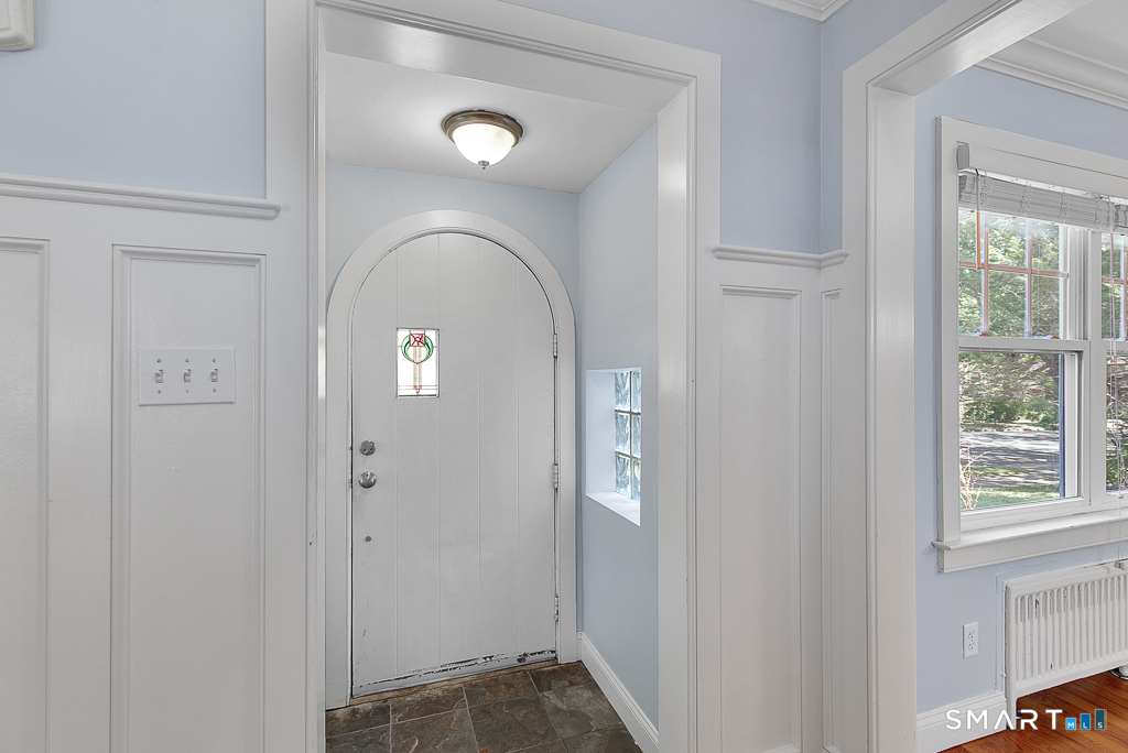 134 Dyer Street New Haven, CT 06511 - Photo 3 of 26 a view of a livingroom with wooden floor and a window