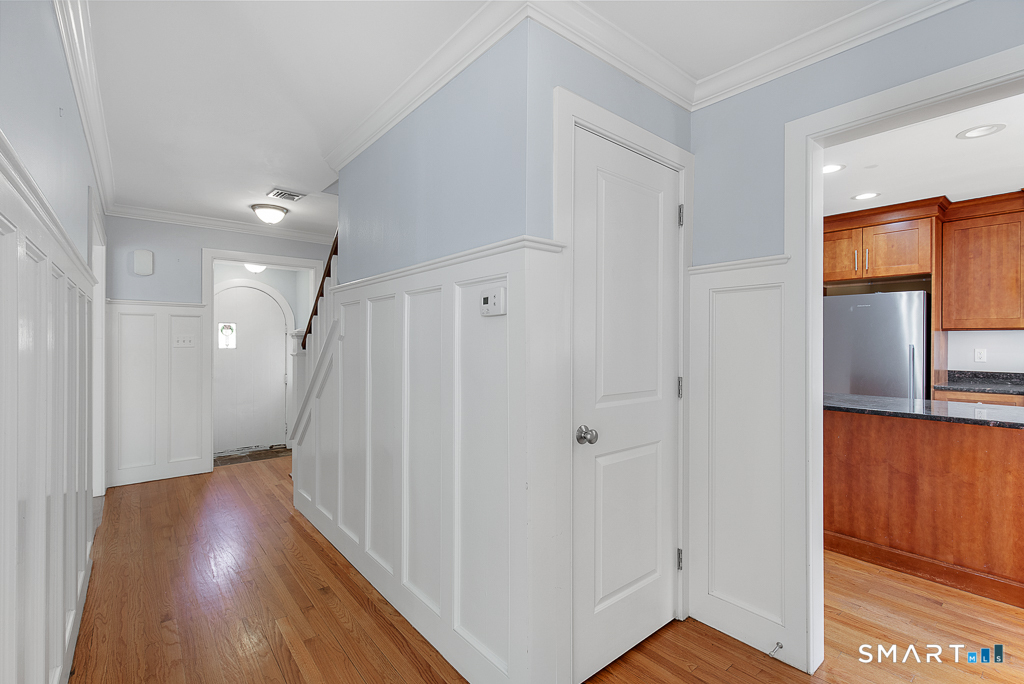 134 Dyer Street New Haven, CT 06511 - Photo 10 of 26 a view of a hallway with wooden floor