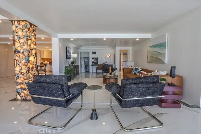 a bedroom with a bed and glass window