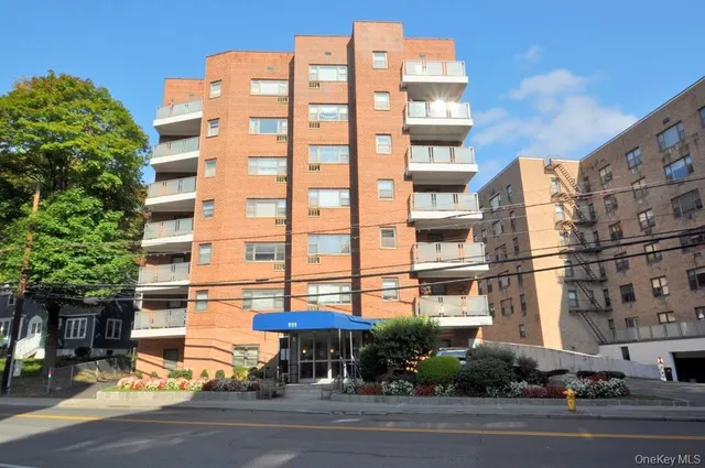 a view of a building with a street