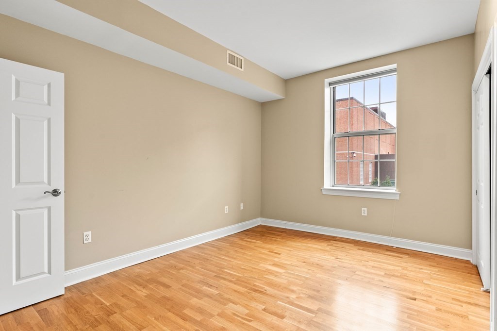 17 Central Street, Unit 9 Salem, MA 01970 - Photo 16 of 27 a view of an empty room with a window