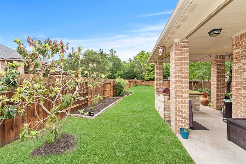8323 Floating Heart Court Conroe, TX 77385 - Photo 43 of 43 a view of outdoor space and yard