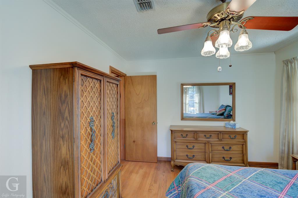 7105 Rodessa Ida Road Ida, LA 71044 - Photo 16 of 40 a view of a bedroom with closet and wooden floor
