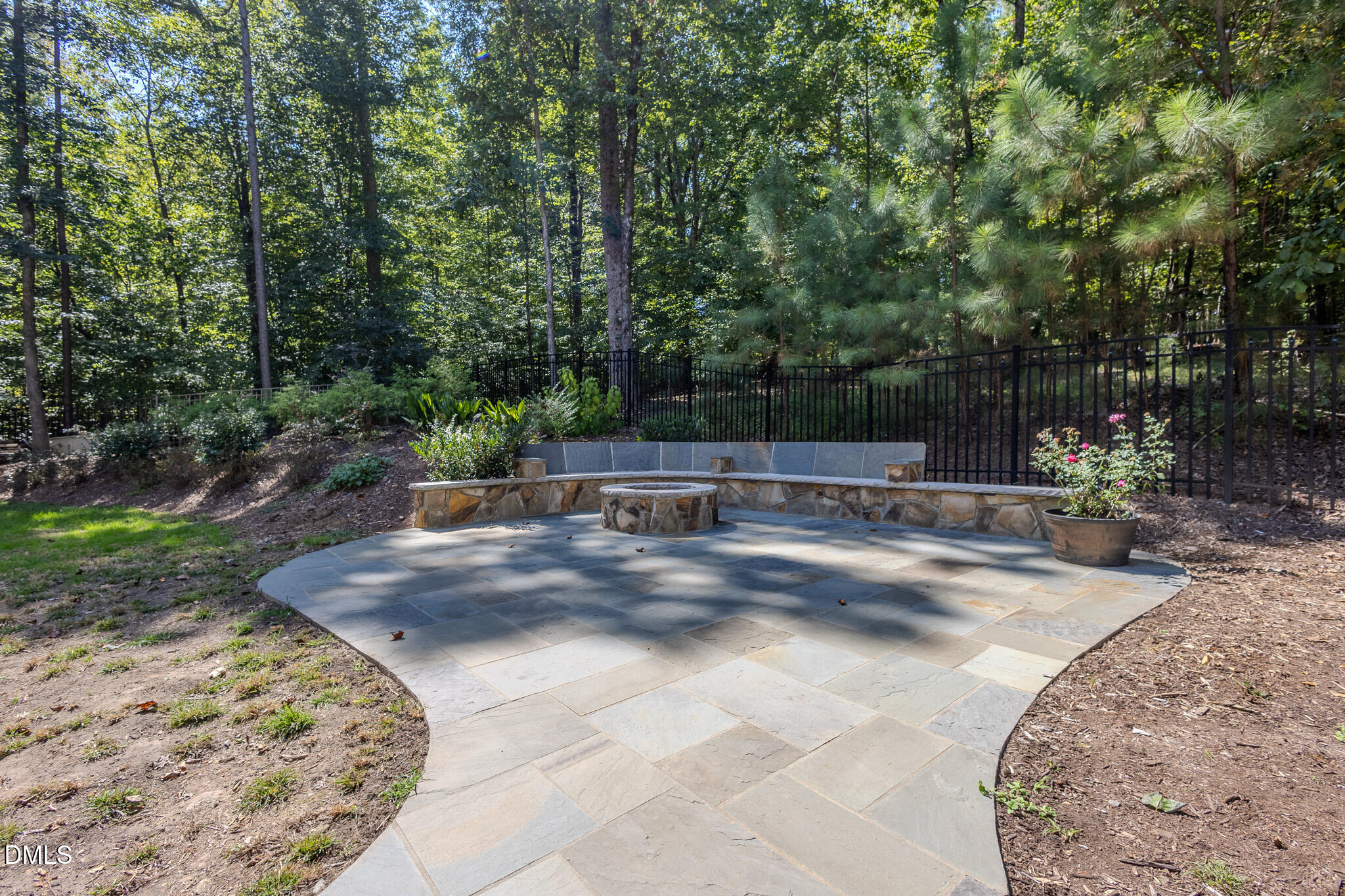 2729 Sunnystone Way Raleigh, NC 27613 - Photo 30 of 37 Custom Bluestone Patio & Firepit