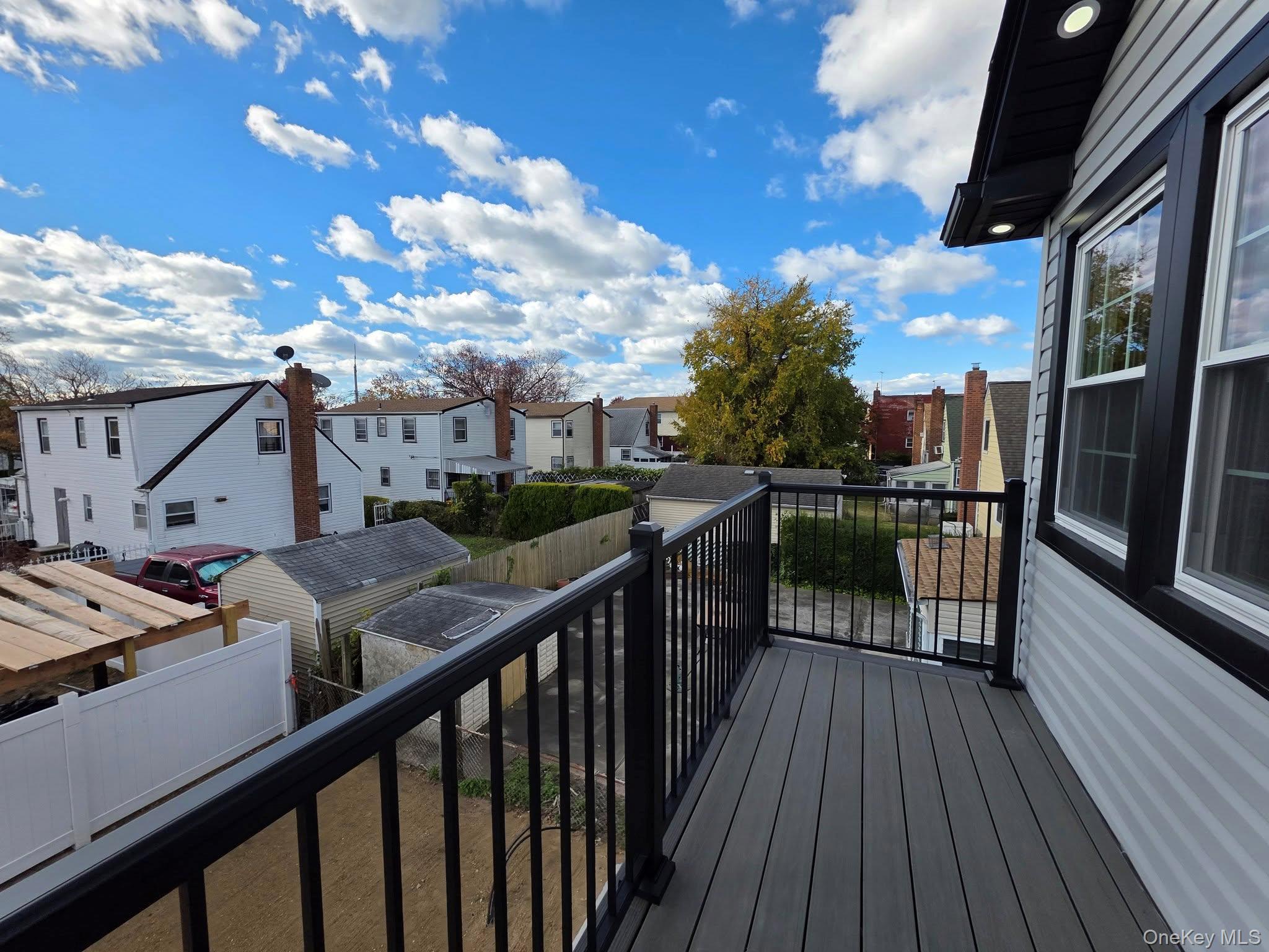 240-02 147th Road Queens, NY 11422 - Photo 18 of 19 a view of a balcony with chairs