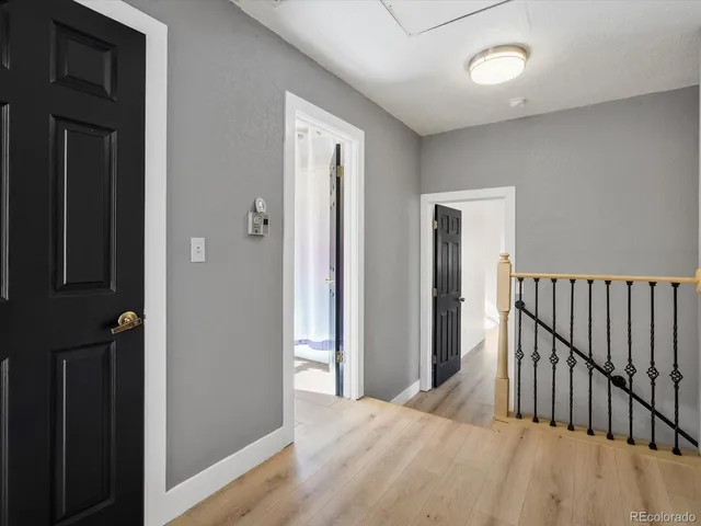a view of a bedroom from a hallway
