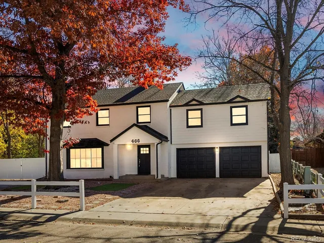 a front view of a house with street