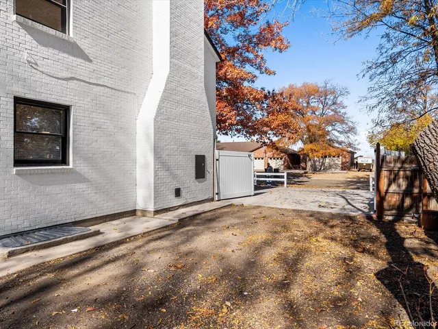 a house with trees in front of it