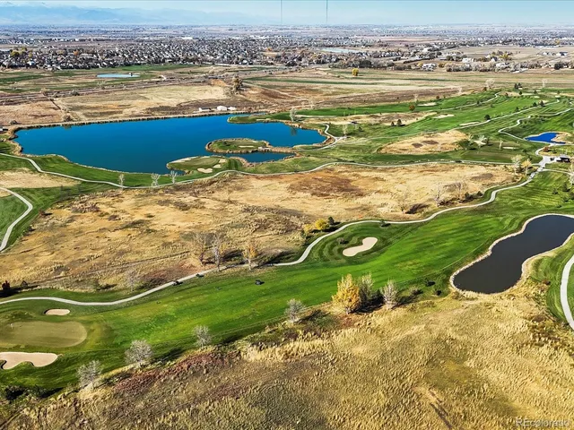 a view of a swimming pool and an ocean view
