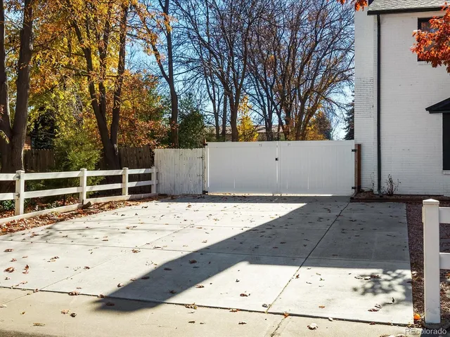 a view of a backyard of the house