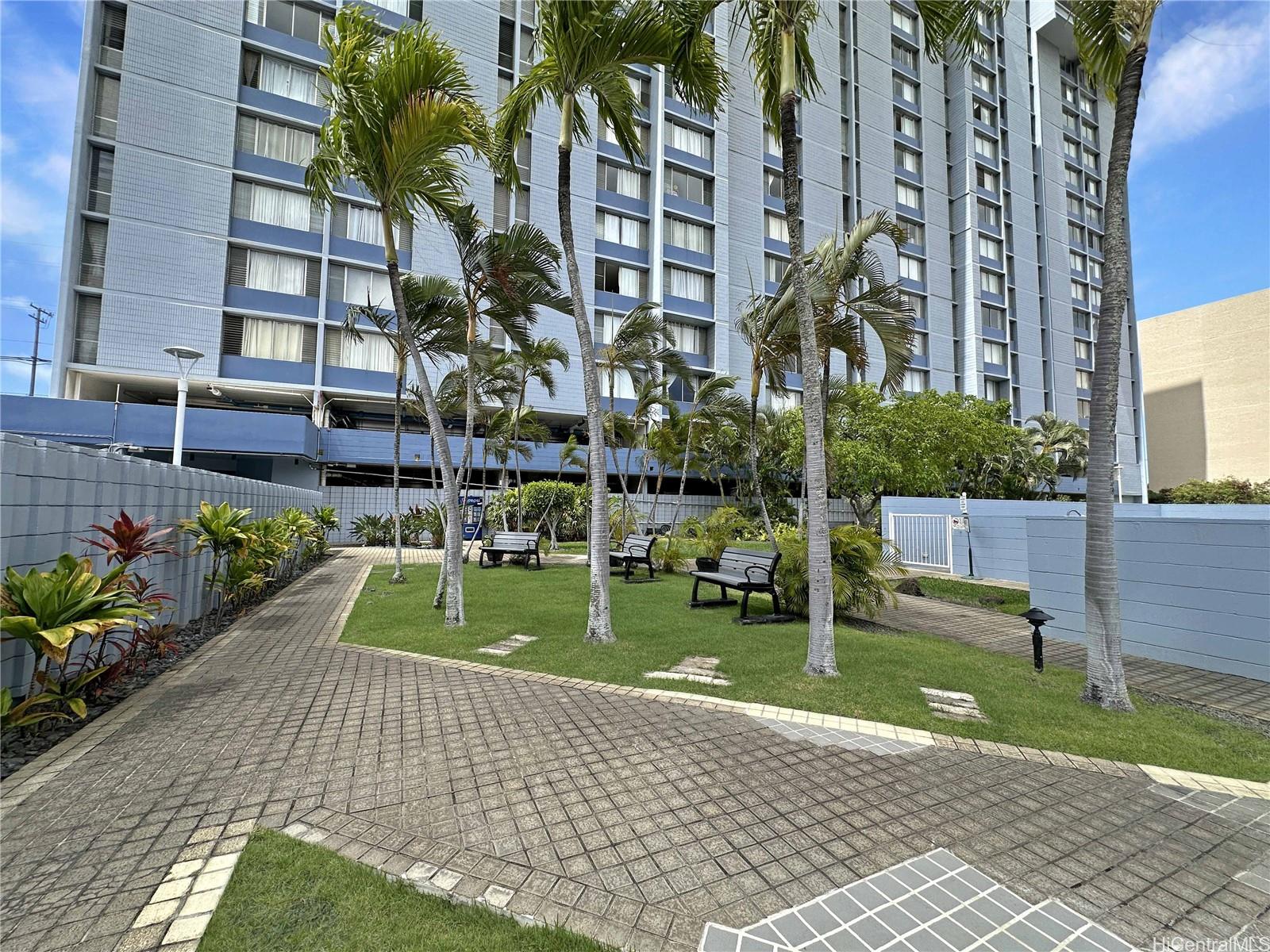 3045 Ala Napuaa Place, Unit 1814 Honolulu, HI 96818 - Photo 14 of 16 a view of a house with a yard