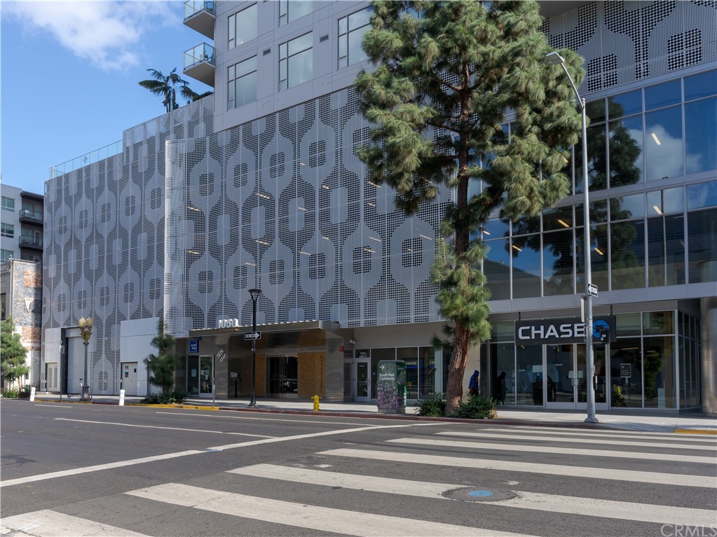 1050 South Grand Avenue, Unit 2004 Los Angeles, CA 90015 - Photo 1 of 23 a tall building sitting on the side of a street