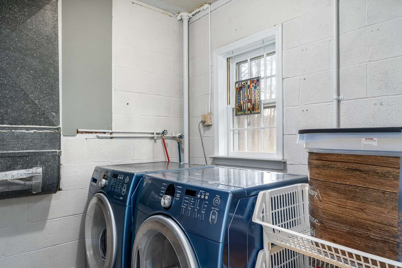 3223 Haddon Road Durham, NC 27705 - Photo 15 of 25 Large basement laundry room with lots of space for sorting and folding - room to spare for storage, too! Laundry